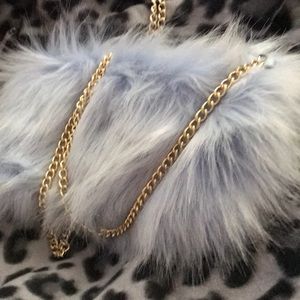 Faux fur baby blue golden chain strapped purse
